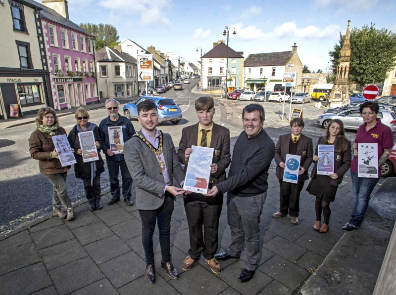 The Mayor of Causeway Coast and Glens Borough Council Councillor Sean Bateson pictured in Ballycastle with some of the artists involved in the street banner project Louie Winward, Hélène Byrne, Roger Perritt (representing Friends of Ballycastle Museum) Rebecca McQuillan, Oliver Bayles, Conal McKay and Raeanne Lowry along with Town and Village Management Officer Shaun Kennedy.