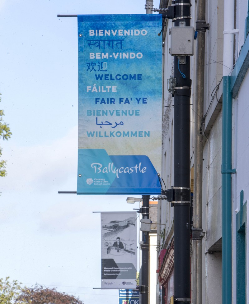 This multi-lingual ‘Welcome’ banner is included in the street banner project in Ballycastle.