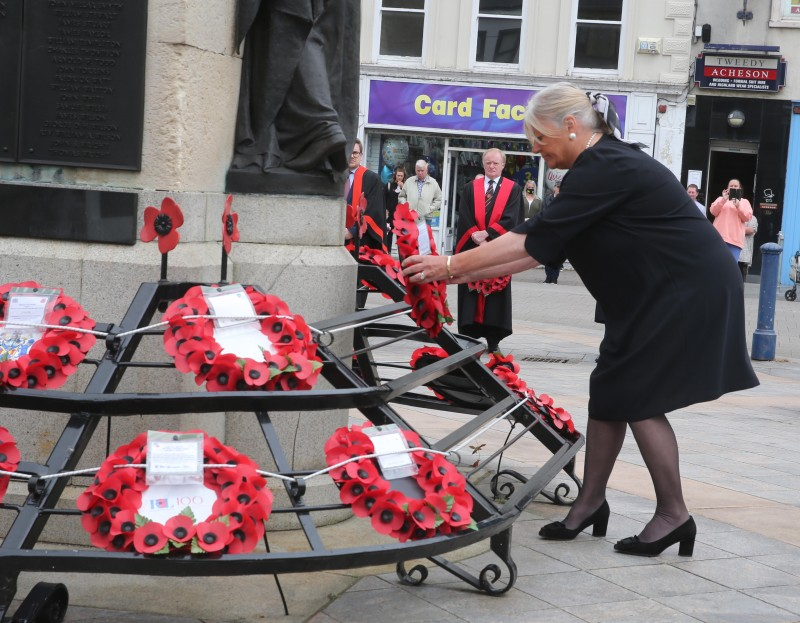 Lorraine Young, Deputy Lieutenant for County Londonderry lays a wreath at the war memorial in Coleraine.