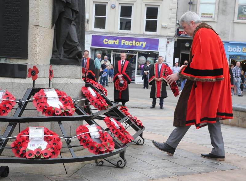 The Mayor of Causeway Coast and Glens Borough Council Councillor Richard Holmes lays a wreath at the war memorial in Coleraine on Thursday 1st July to remember lives lost during the Battle of the Somme.