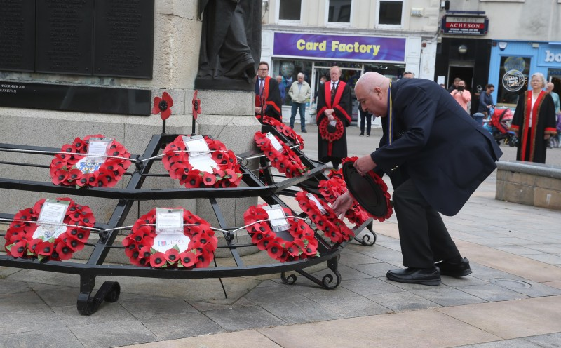 Ronnie Galbraith, Chairman of Coleraine Royal British Legion, lays a wreath at the war memorial in Coleraine during the Battle of the Somme commemoration.