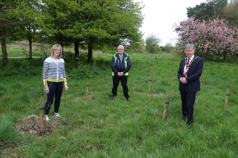 The Mayor of Causeway Coast and Glens Borough Council Alderman Mark Fielding pictured at Riverside Park in Ballymoney where 25 trees have been planted to mark the centenary of Soroptimist International with President Pamela Smyth and Kenny Henry from Conservation Volunteers.