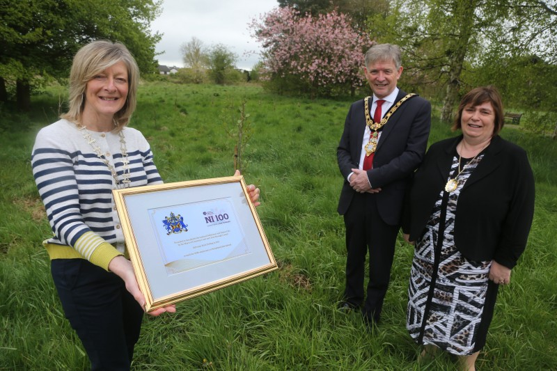 Pamela Smyth, President of the Ballymoney and District Club of Soroptimist International, pictured with the framed centenary certificate received from the Mayor of Causeway Coast and Glens Borough Council Alderman Mark Fielding and Mayoress Mrs Phyliss Fielding.