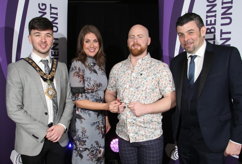 Michael McMillan (Judo), winner of the Sportsperson with a Disability award, pictured with the Mayor of Causeway Coast and Glens Borough Council Councillor Sean Bateson, Master of Ceremonies Sarah Travers and Barry Dallat, representing award sponsor Arbutus Catering Group.