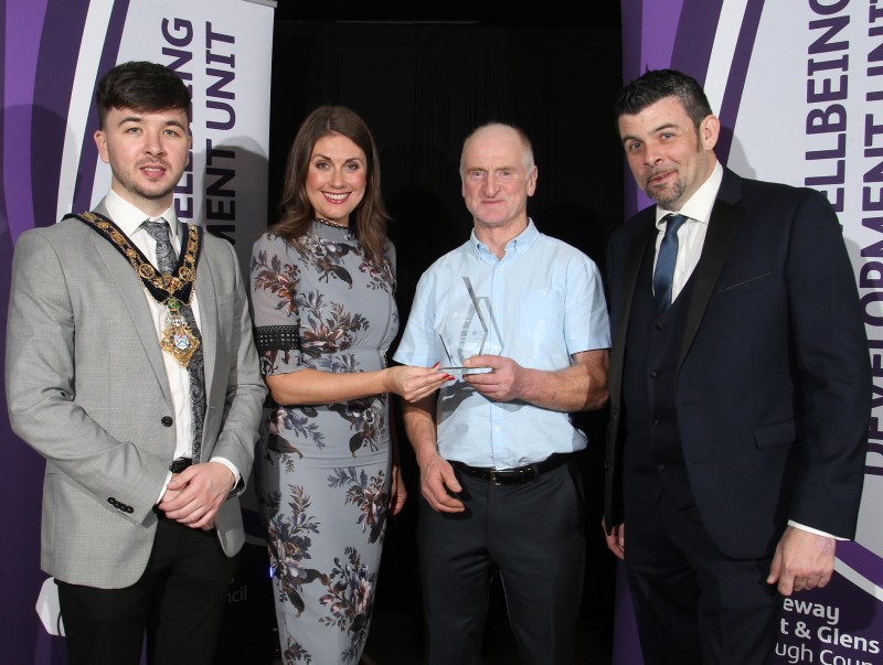 Hugh Boyle (Running), winner of the Merit Award of the Year, pictured with the Mayor of Causeway Coast and Glens Borough Council Councillor Sean Bateson, Master of Ceremonies Sarah Travers and Barry Dallat, representing award sponsor Arbutus Catering Group.