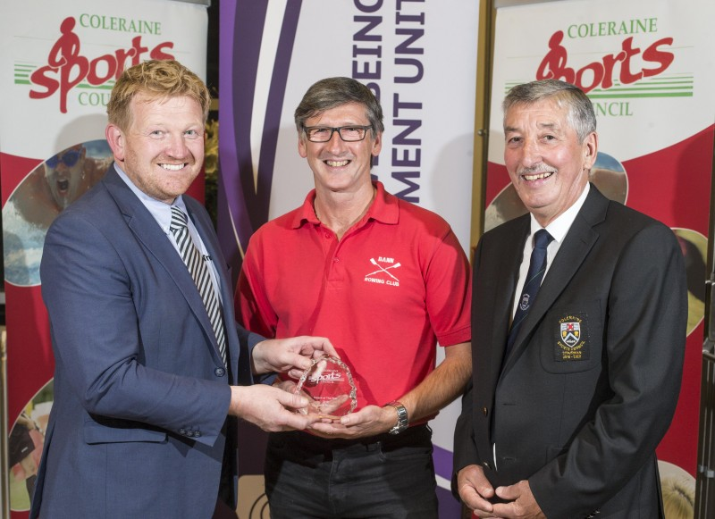 Coach of The Year, Geoff Bones accepts his award from Roy Dixon, Ford Coleraine and John Church, Chair of Coleraine Sports Council.