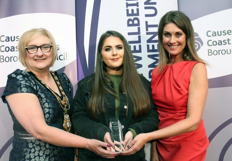 The Sportswoman of the Year award, sponsored by Kennedy Orthodontics, was won by bowler Shauna O’Neill pictured with the Mayor of Causeway Coast and Glens Borough Council Councillor Brenda Chivers and awards host Sarah Travers.