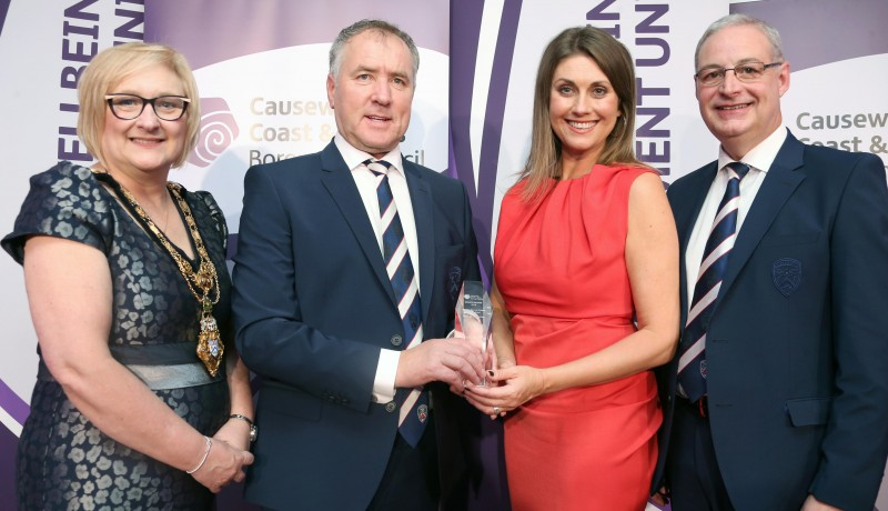 Chairman Colin McKendry and Vice Chairman Raymond Smyth accept the Senior Sports Team of the Year award, sponsored by Grafton Recruitment, on behalf of Coleraine FC pictured with the Mayor of Causeway Coast and Glens Borough Council Councillor Brenda Chivers and host Sarah Travers
