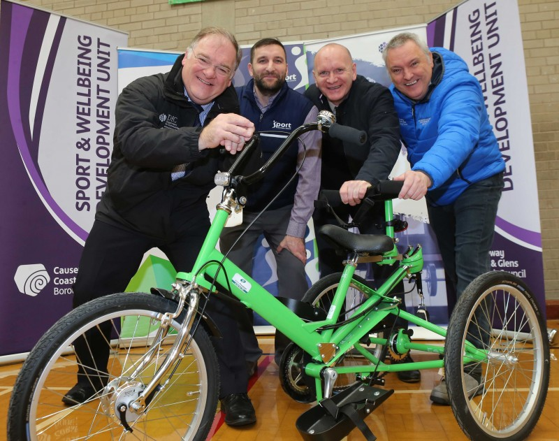 Robert Heyburn from Department for Communities, Conor Cunning from Sport NI with Damian McAfee and Roger Downey from Causeway Coast and Glens Borough Council pictured with one of the new trikes.