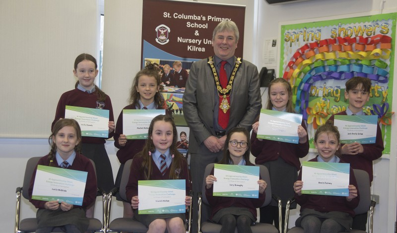 The Mayor of Causeway Coast and Glens Borough Council Councillor Richard Holmes pictured with Primary 6 pupils from St Columba’s Primary School in Kilrea who took part in the Energy Innovation Challenge during Northern Ireland Apprenticeship Week