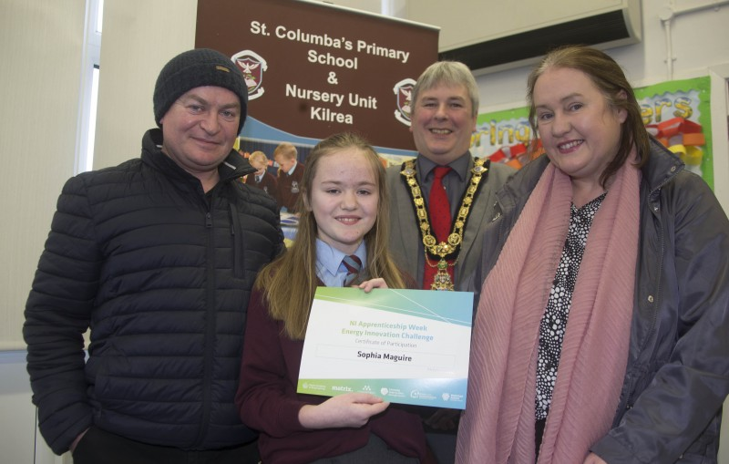 The Mayor of Causeway Coast and Glens Borough Council Councillor Richard Holmes pictured with Energy Innovation Challenge winner Sophia Maguire and her parents Caroline & Kevin