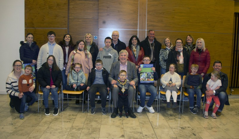 The Mayor of Causeway Coast and Glens Borough Council Councillor Richard Holmes pictured with members of the Causeway Downs Syndrome Support Group in Cloonavin ahead of World Downs Syndrome Awareness Week.