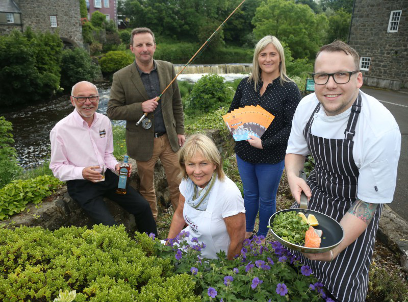 Deidre Simpson and John Kane from the Department of Agriculture, Environment and Rural Affairs help to launch the Bushmills Salmon and Whiskey Festival which takes place on June 17th and 18th with Nial Mehaffey and Chris Gibson from Bushmills Distillery, and celebrity chef Jenny Bristow.