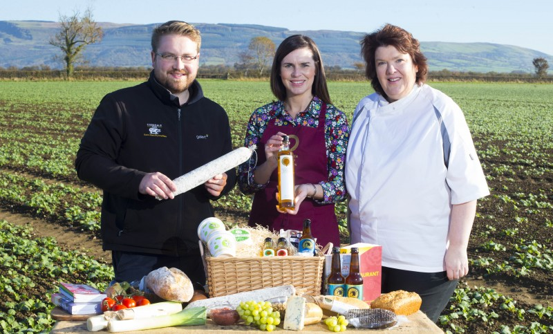 Pictured against the beautiful backdrop of Binevenagh mountain are local producers Alastair Crown from Corndale Farm and Leona Kane from Broighter Gold pictured with local food ambassador Paula McIntyre for the launch of Taste Causeway, a new 9-day culinary celebration which takes place across the Causeway Coast and Glens from November 10th - 18th