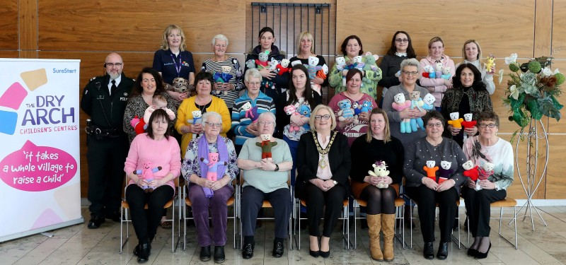 The Mayor of Causeway Coast and Glens Borough Council Councillor Brenda Chivers pictured with the Trauma Teddy Knitters from Coleraine and Dungiven and Sergeant Darrell McIvor at a recent civic reception in Cloonavin.