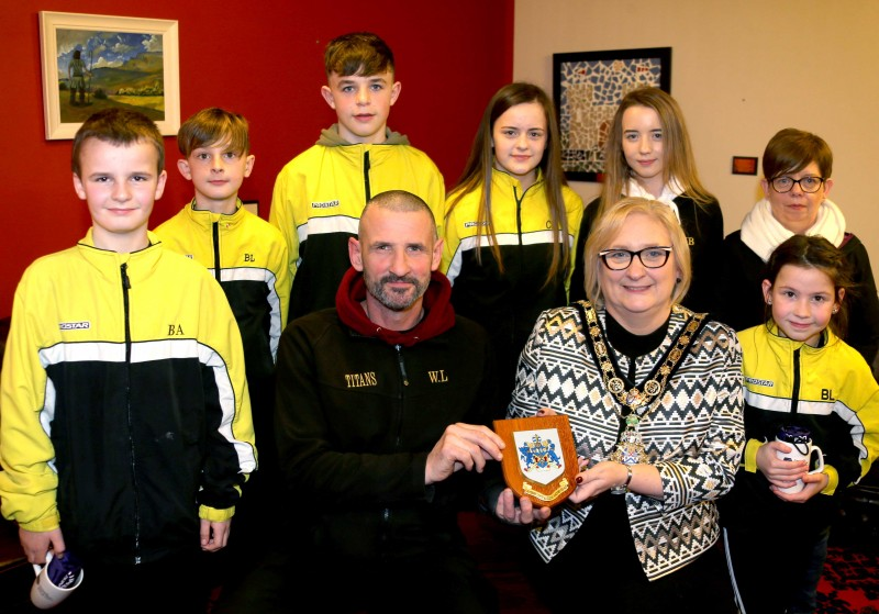 Younger members of Limavady Titans pictured with Head Coach Willie Lowry who was presented with a Coat of Arms by the Mayor of Causeway Coast and Glens Borough Council Councillor Brenda Chivers at a recent civic reception held in the group’s honour.