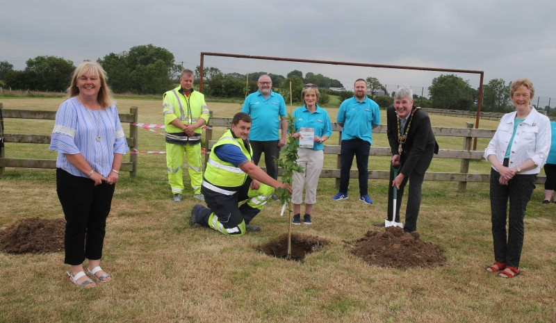 Sammy Laverty, Anita McFarlane and Ryan McIlmoyle from Mosside Community Association pictured with the Mayor of Causeway Coast and Glens Borough Council Councillor Richard Holmes, Councillor Joan Baird, Councillor Margaret Anne McKillop and Council staff at the tree planting event in Mosside.