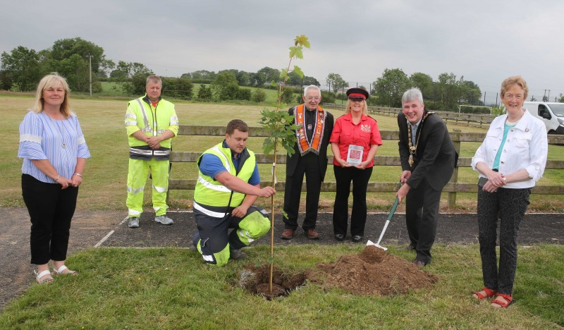 Colleen Connelly and John Lamont representing Mosside Independent Accordion Band and Lodge LOL No 25 pictured with the Mayor of Causeway Coast and Glens Borough Council, Councillor Richard Holmes, Councillor Joan Baird, Councillor Margaret Anne McKillop, and Council staff at the tree planting event in Mosside.