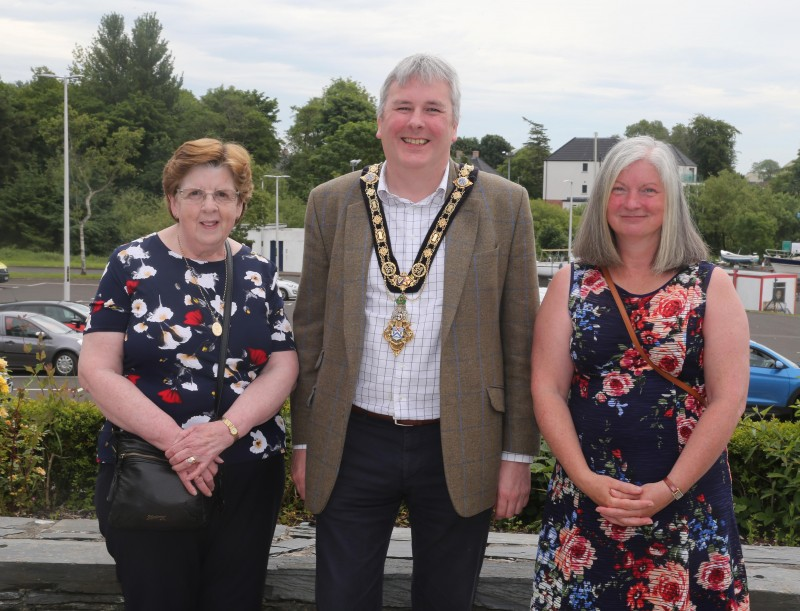 The Mayor of Causeway Coast and Glens Borough Council Councillor Richard Holmes pictured with St Vincent de Paul Area President Anne Irwin (left) and Roisin Doherty from the St Vincent de Paul group in Portrush at the event in Cloonavin to mark the contribution made by volunteers across the Borough.