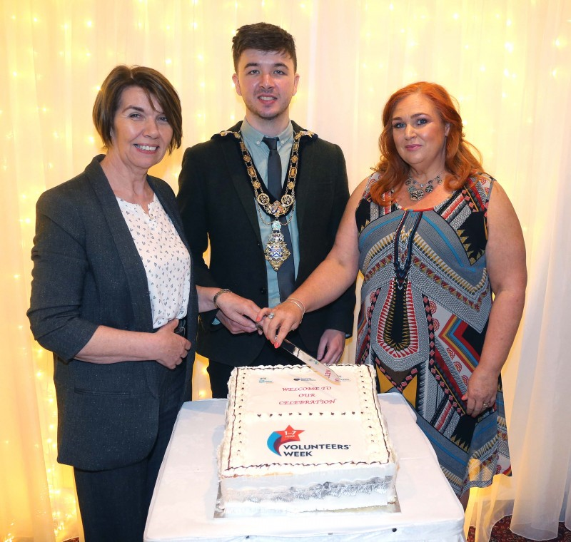 The Mayor of Causeway Coast and Glens Borough Council Councillor Sean Bateson pictured with Mary McNickle from Causeway Volunteer Centre and Ashleen Schenning from Limavady Volunteer Centre at the recent Volunteers’ Week celebration in The Bushtown Hotel.