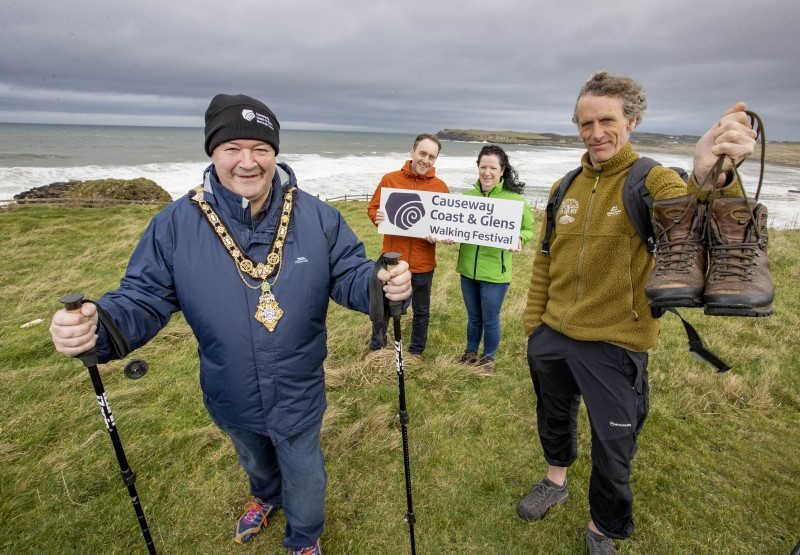 The Mayor of Causeway Coast and Glens Borough Council, Councillor Ivor Wallace, launches the Causeway Coast and Glens Walking Festival along with Lorcan McBride from local activity provider Far and Wild, Coast and Countryside Officer Mark Strong and Trade Engagement Officer Siobhan McKenna. The Causeway Coast and Glens Walking Festival takes place from March 31st to April 2nd with a range of inspiring guided walks through the area’s dramatic landscapes. Go to  www.visitcausewaycoastandglens.com/whats-on to find out more.
