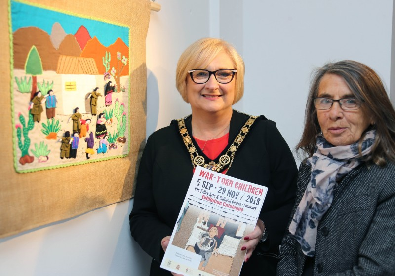 The Mayor of Causeway Coast and Glens Borough Council Councillor Brenda Chivers pictured with the War-Torn Children exhibition curator Roberta Bacic.
