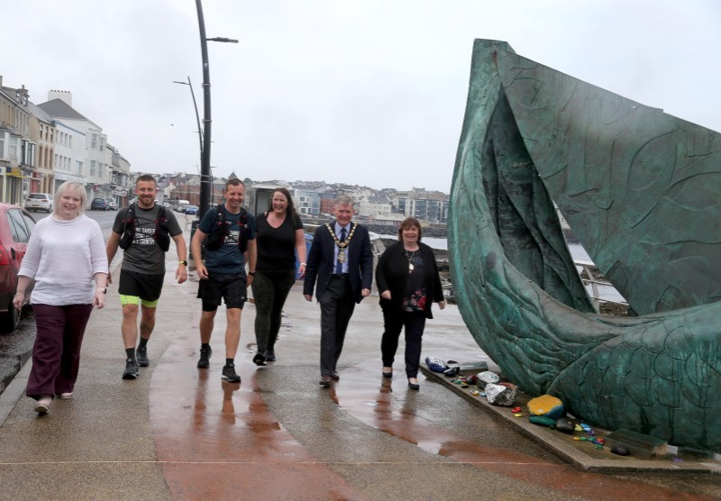 Connor Ferguson and Ian Reid are welcomed to Portstewart by the Mayor of Causeway Coast and Glens Borough Council, the Mayoress, Mrs Phyllis Fielding and Council’s Veterans’ Champion, Councillor Michelle Knight McQuillan and Rachel Cochrane from British Forces Broadcasting Service