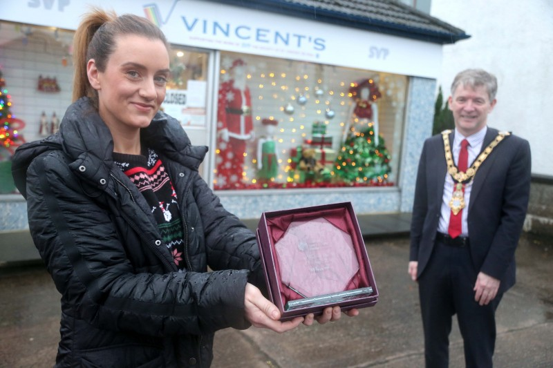 In Cushendall Vincent's was the winner of the Best Christmas Window and the Mayor of Causeway Coast and Glens Borough Council Alderman Mark Fielding presented the award to Seana Lynn.
