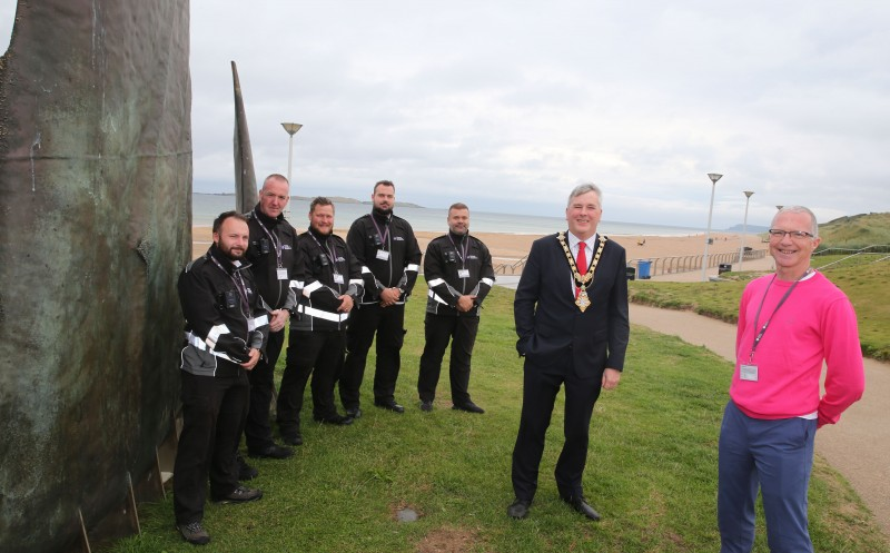 The Mayor of Causeway Coast and Glens Borough Council Councillor Richard Holmes pictured with Head of Health and Built Environment Bryan Edgar at East Strand in Portrush with officers from Waste Investigations Support & Enforcement (WISE) who are on now patrol across the borough to target those who litter as well as those who don’t clean up after their dogs.