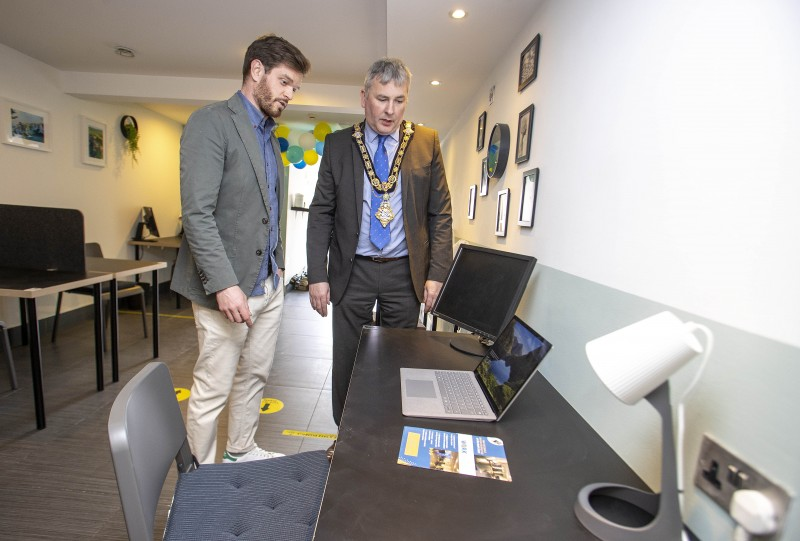 Owner Ben Brennan shows the Mayor of Causeway Coast and Glens Borough Council, Councillor Richard Holmes, around The WorkSpace, a new remote working hub in Portrush.