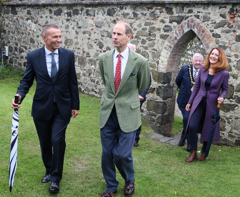 The Duke of Edinburgh accompanies David Jackson, Chief Executive of Causeway Coast and Glens Borough Council, Mayor of Causeway Coast and Glens Borough Council, Councillor Steven Callaghan QPM and Heather McLachlan, National Trust Director for Northern Ireland as they enter the walled garden at Downhill Demesne.