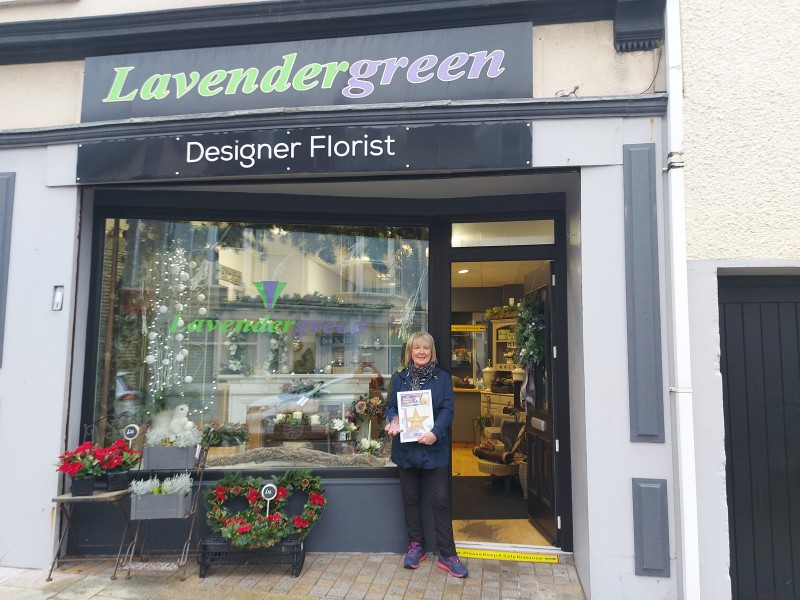 Jean Stewart from Lavender Green florists in Portrush, winners of the Best Dressed Christmas Window in Portrush.