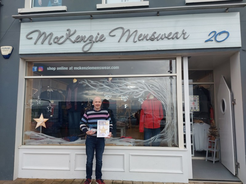 Derek Leighton from McKenzie Menswear, winners of the Best Dressed Christmas Window in Portstewart.