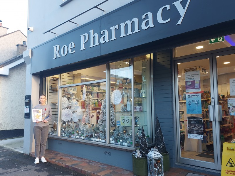 Ann Gallagher from Roe Pharmacy, winners of the Best Dressed Christmas Window in Dungiven.