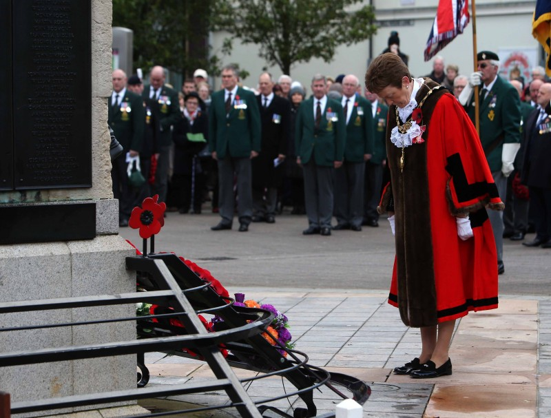The Mayor of Causeway Coast and Glens Borough Council, Councillor Joan Baird OBE, pictured as she lays a wreath during the Act of Remembrance at The War Memorial in Coleraine.