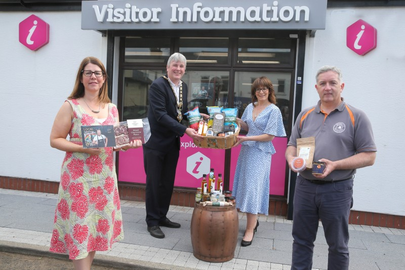 Caroline Carey, Causeway Coast and Glens Borough Council’s Visitor Servicing Officer, the Mayor of Causeway Coast and Glens Borough Council Councillor Richard Holmes, Stella Bolton, Taste Causeway CIC Board Member, and Eoin McConnell from Naturally North Coast and Glens Artisan Market pictured at Bushmills Visitor Information Centre to mark the start of a new collaboration which will see Taste Causeway products sold in Visitor Information Centres in Ballycastle, Bushmills, Limavady and Portrush.