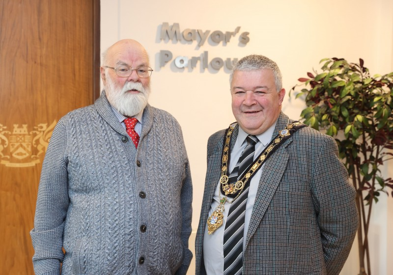 David Boyle ‘The Caring Caretaker’ pictured alongside Mayor of Causeway Coast and Glens Borough Council Councillor Ivor Wallace at a special reception held in Cloonavin to recognise David’s fundraising efforts.
