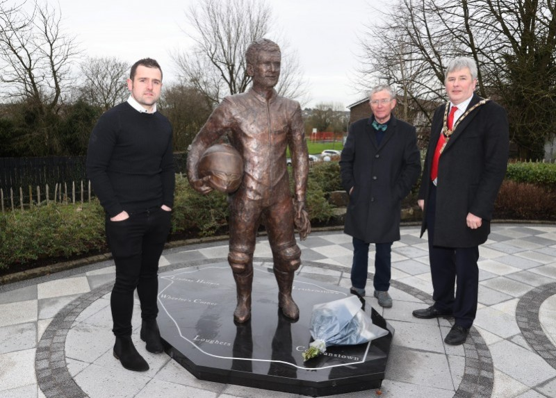 Michael Dunlop, artist David Annand and the Mayor of Causeway Coast and Glens Borough Council Councillor Richard Holmes pictured at the unveiling of a new statue of William Dunlop at the Dunlop Memorial Gardens in Ballymoney.