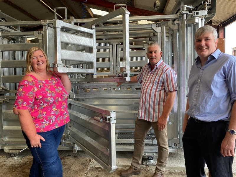 Pictured at the Chestnutt family farm outside Bushmills, where this new crush has been installed to increase safety, are the Mayor of Causeway Coast and Glens Borough Council Councillor Richard Holmes, Councillor Sandra Hunter, who runs her own farm near the Giant’s Causeway, and Victor Chestnutt, farmer and President of the UFU