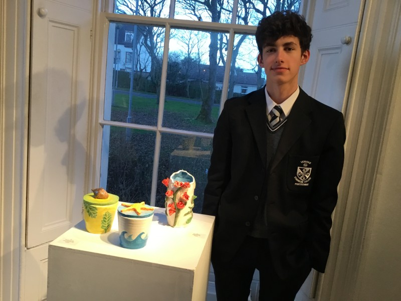 GCSE student Filip Rygielski from Dominican College pictured with his pieces of art featured in The Dominican Collective Exhibition at Flowerfield Arts Centre in Portstewart.