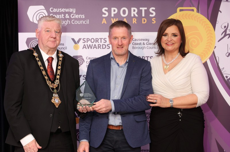 Coach of the Year, Gregory O’Kane accepts his award from Denise Watson and Mayor, Councillor Steven Callaghan.