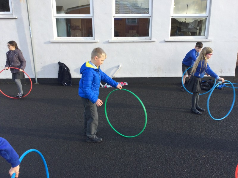 Pupils from Macosquin Primary School enjoy a hula-hoop activity as part of the Heritage Games organized by Causeway Coast and Glens Borough Council.