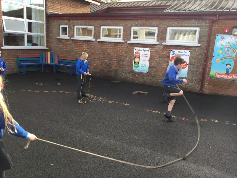 Pupils from Macosquin Primary School enjoy skipping in the school-yard as part of the Heritage Games organized by Causeway Coast and Glens Borough Council.