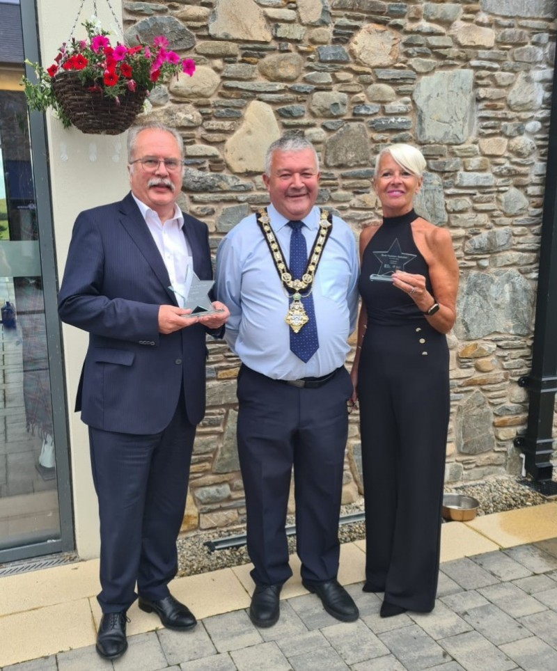 Ian Donaghey pictured with Coleraine’s award for High Street of the Year, along with the Mayor of Causeway Coast and Glens Borough Council, Councillor Ivor Wallace and Terese from Couples in Coleraine, winner of the Fashion Retailer of the Year.
