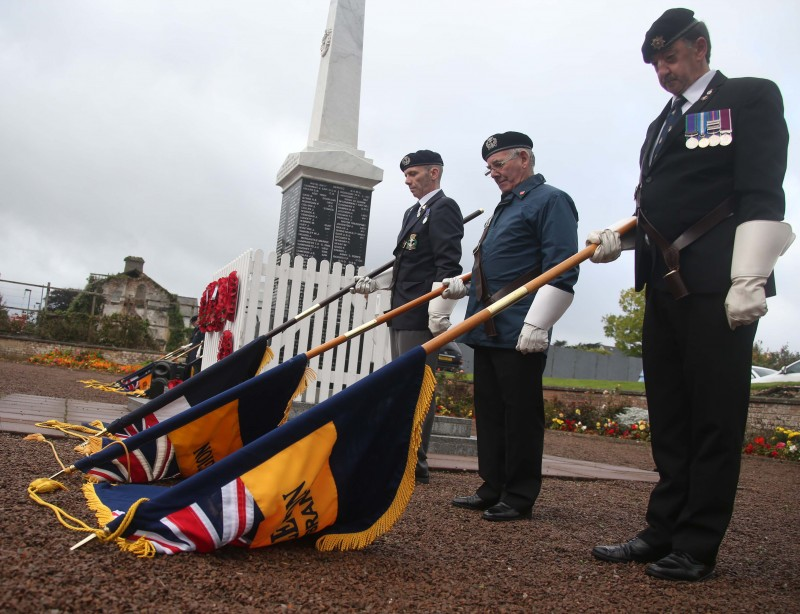 The Standards are lowered during the centenary commemoration.