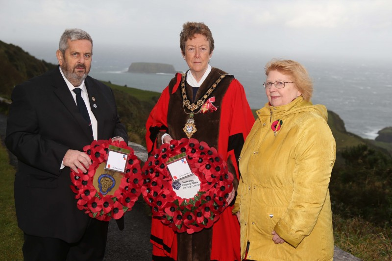Margaret Patterson, niece of James Patterson who was lost with HMS Drake, pictured with the Mayor of Causeway Coast and Glens Borough Council, Councillor Joan Baird OBE, and James McCurdy from Ballycastle RBL.