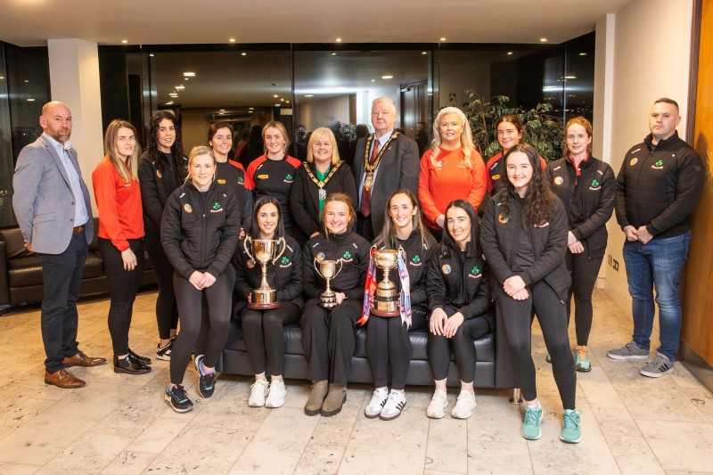 Mayor of Causeway Coast and Glens, Councillor Steven Callaghan, Deputy Mayor Cllr Margaret-Anne McKillop and Cllr Maighréad Watson pictured at Cloonavin with Loughgiel Shamrocks Senior Camogie team.