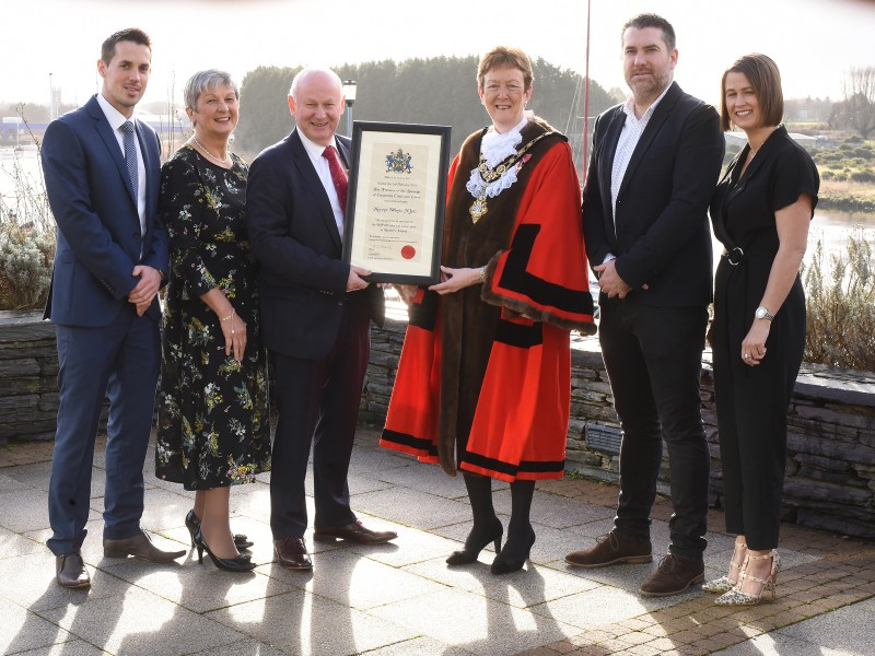 The new Freeman of the Borough of Causeway Coast and Glens Mervyn Whyte pictured with his wife Hazel and children Peter, Ryan and Rachael alongside the Mayor, Councillor Joan Baird OBE.
