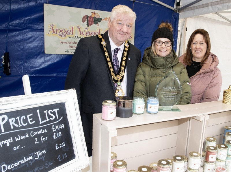 Mayor of Causeway Coast and Glens, Councillor Steven Callaghan with Lynne Rainey of Angel Wood Candles and Catrina McNeill, Council’s Town Project officer.