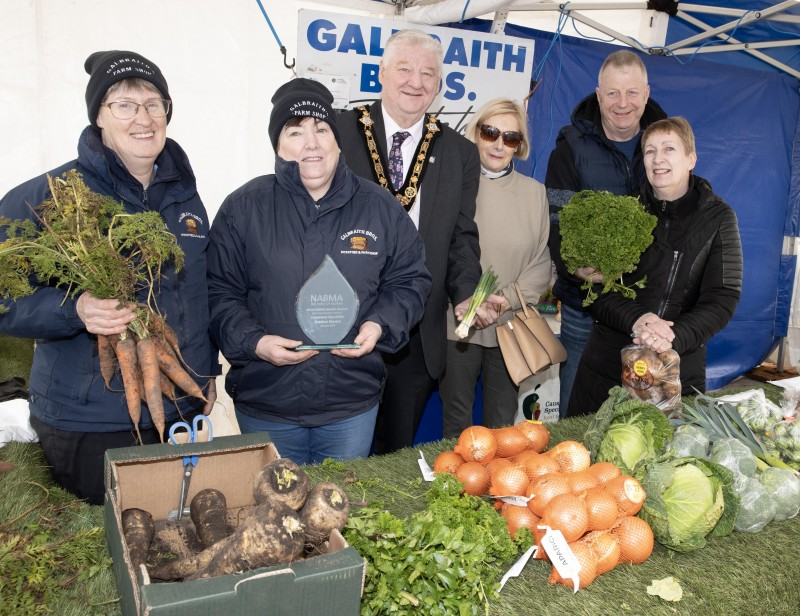 Mayor, Councillor Steven Callaghan and Lord-Lieutenant of County Londonderry, Alison Millar join customers to check out some of the fresh produce on offer at Galbraith’s Farm Shop, with traders Denise & Sandra.